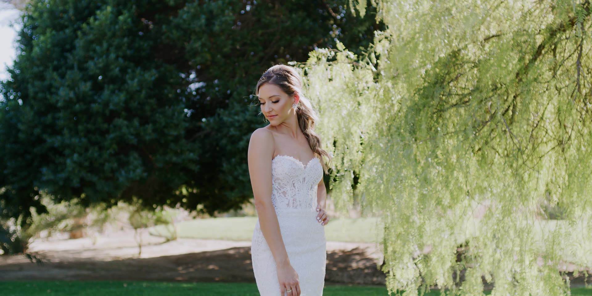 Angelique walking the lawn past the willow at Old Polo Estate