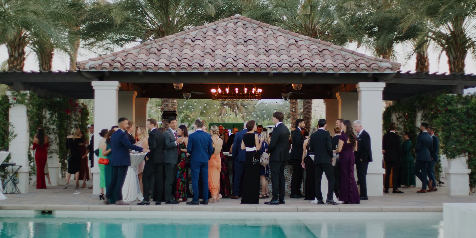 Cocktail hour beside the pool and tiled pavilion at Old Polo Estate