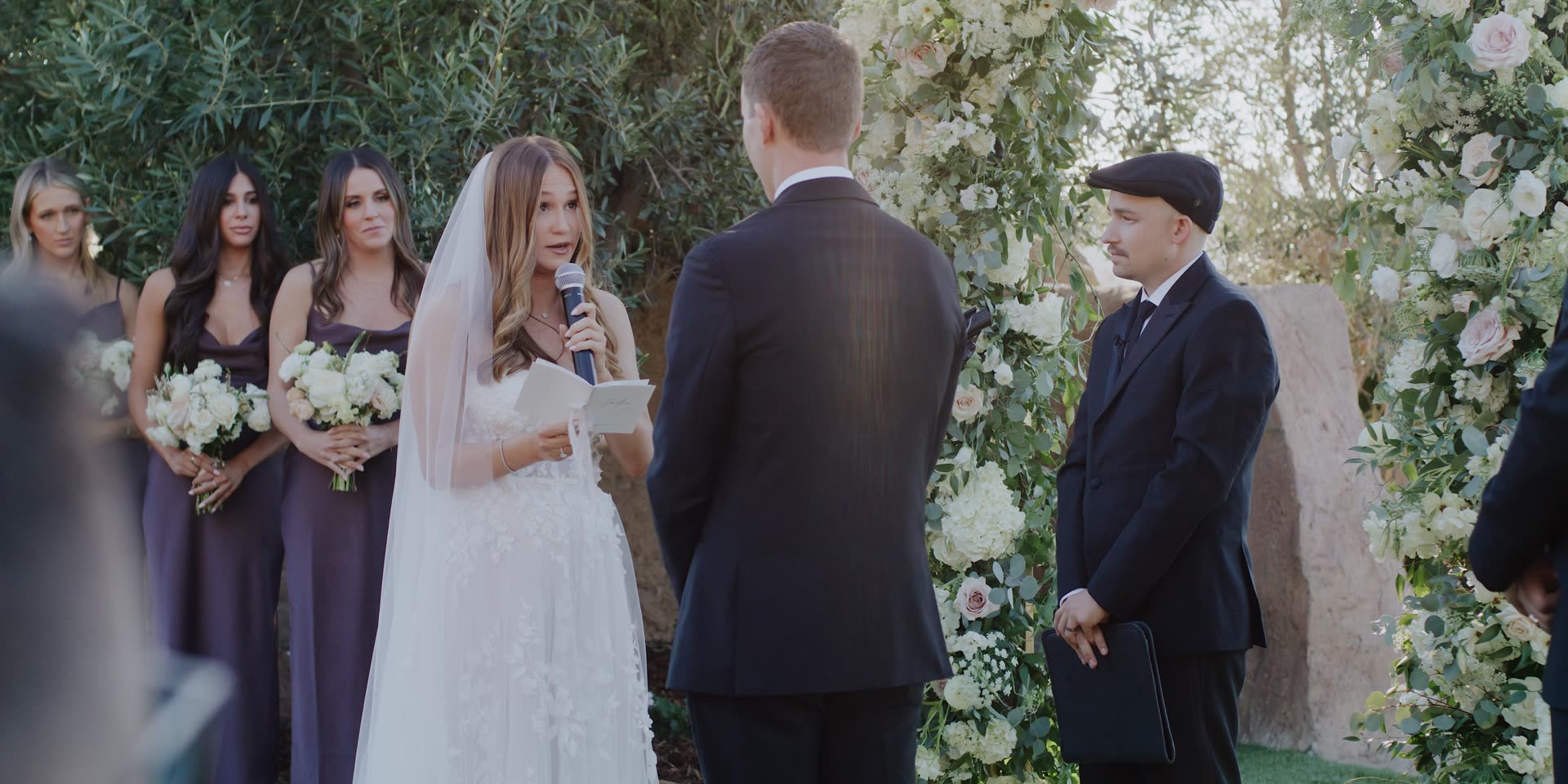 Andy and Emily at the altar with their wedding party at Cielo Farms