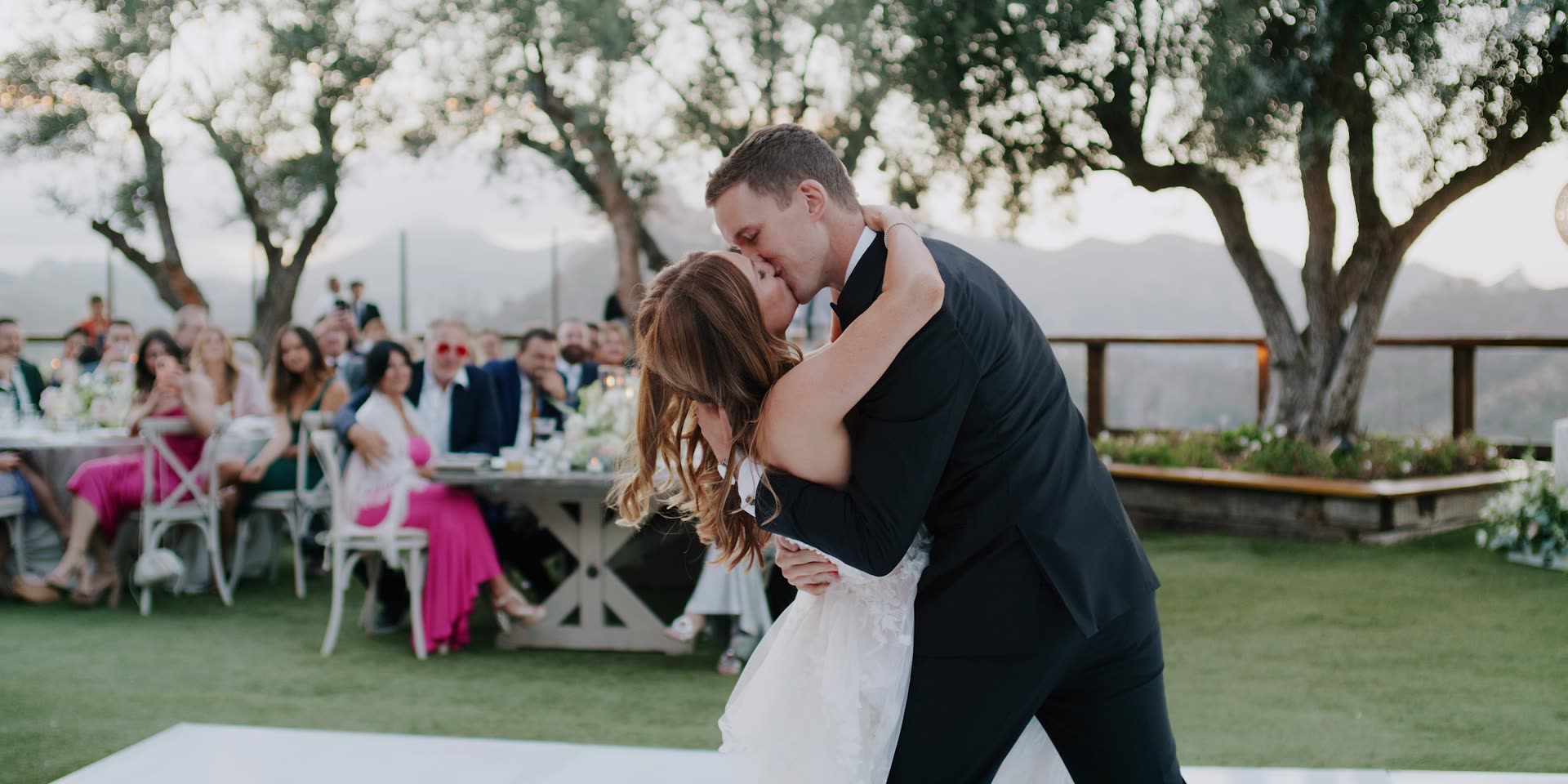 Andy and Emily during their first dance among the olive trees at Cielo Farms