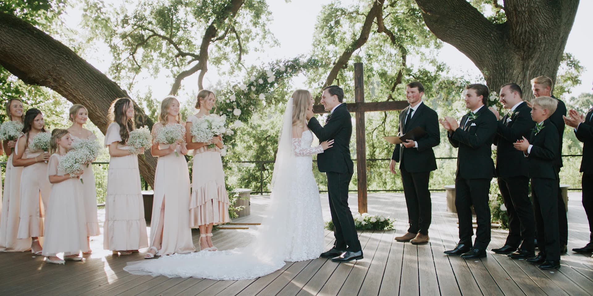 Anna and Jett's ceremony beneath the oak with their wedding party, in Kingsburg
