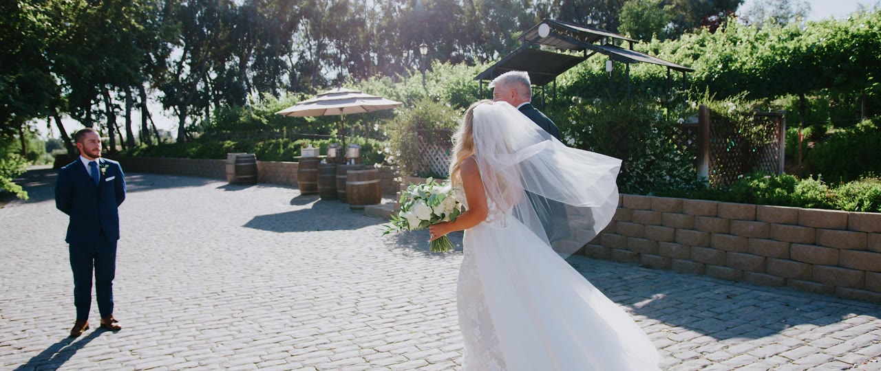 Erin walking to Brandon for their first look at Lake Oak Meadows