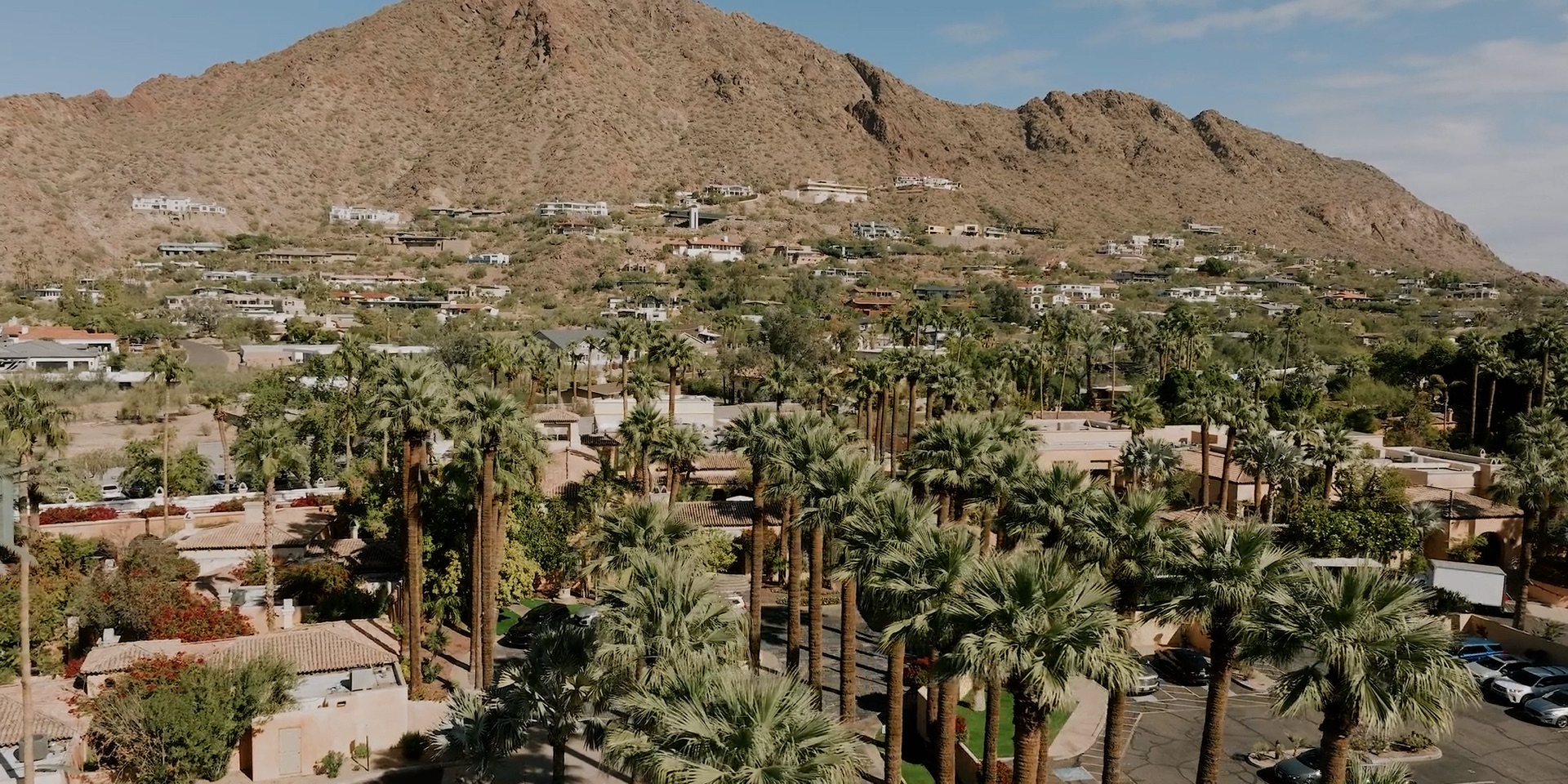 Aerial view of Royal Palms Resort and Spa in Phoenix, Arizona, its date palms and Spanish Colonial estate set at the foot of Camelback Mountain