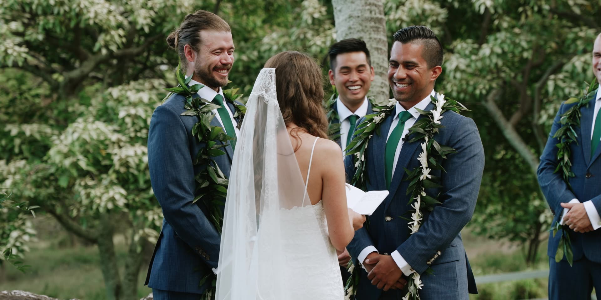The ceremony at Paliku Gardens, the groomsmen in maile leis, Kualoa Ranch