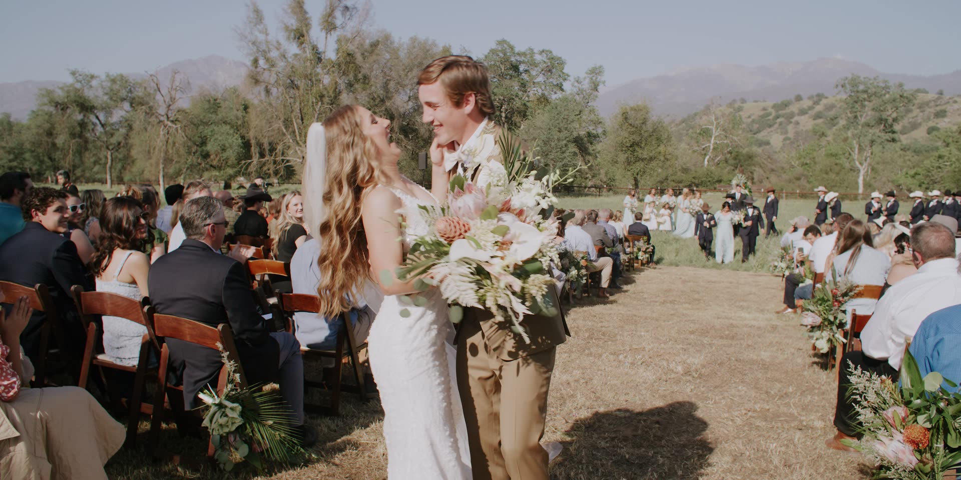 Cal and Khloe's kiss as they walk back down the aisle in Kingsburg