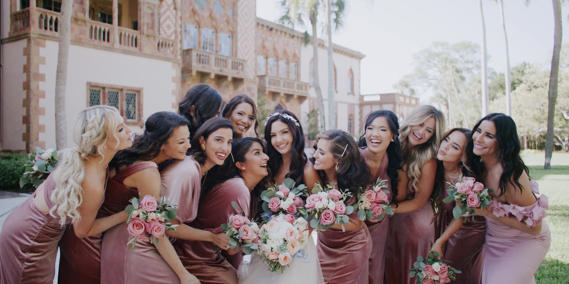 The bridesmaids gathered in front of the mansion in Sarasota