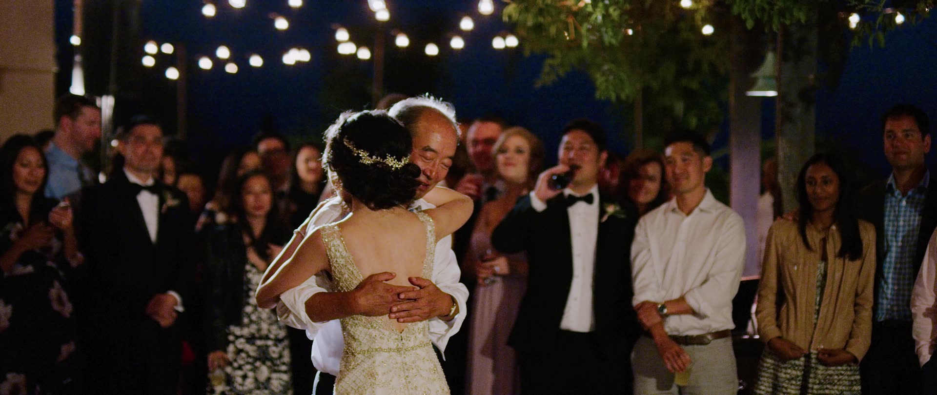 David and Liz dancing surrounded by their guests at Villa Verano