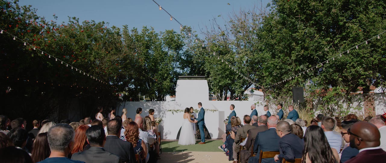 Eric and Esther's courtyard ceremony under the market lights at the Casino San Clemente