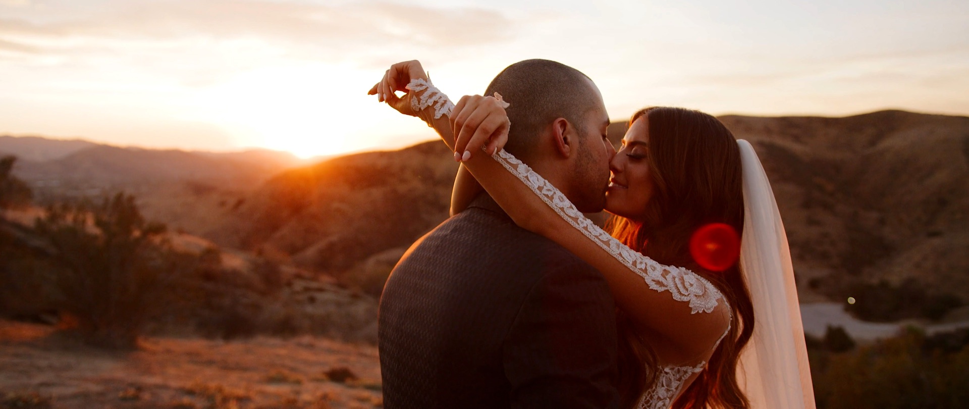 A couple at sunset at Hummingbird Nest Ranch