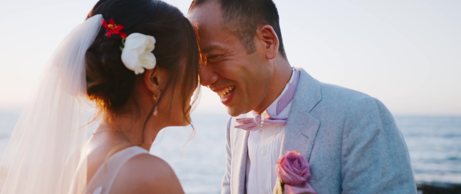 A wedding film still at Ocean Gardens, Paradise Cove, Oahu