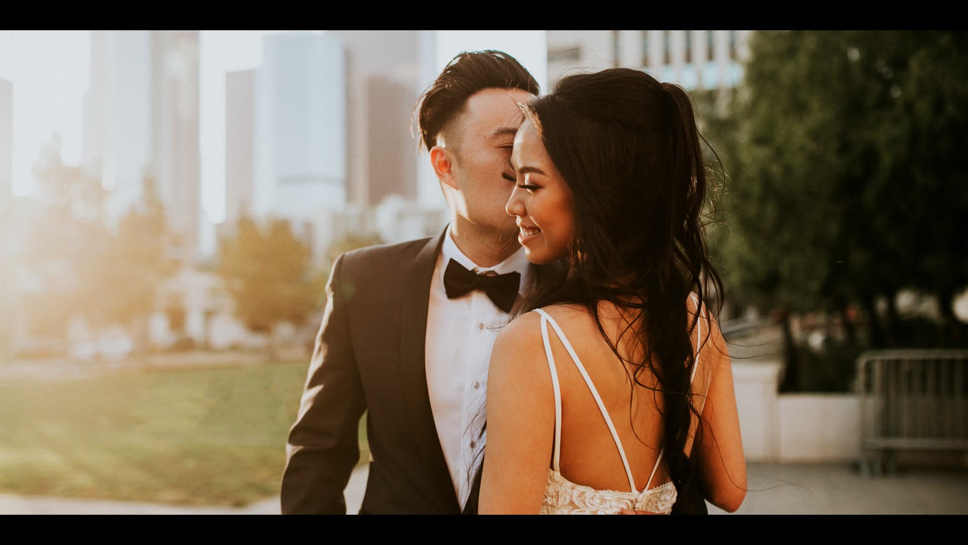 Matt and Leslie together with the downtown Los Angeles skyline rising behind them