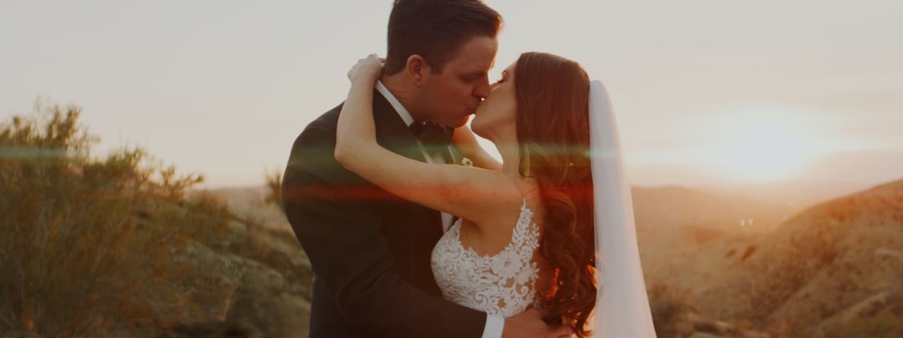 Ryan and Kristina kissing at sunset in the Santa Susana hills at Hummingbird Nest Ranch