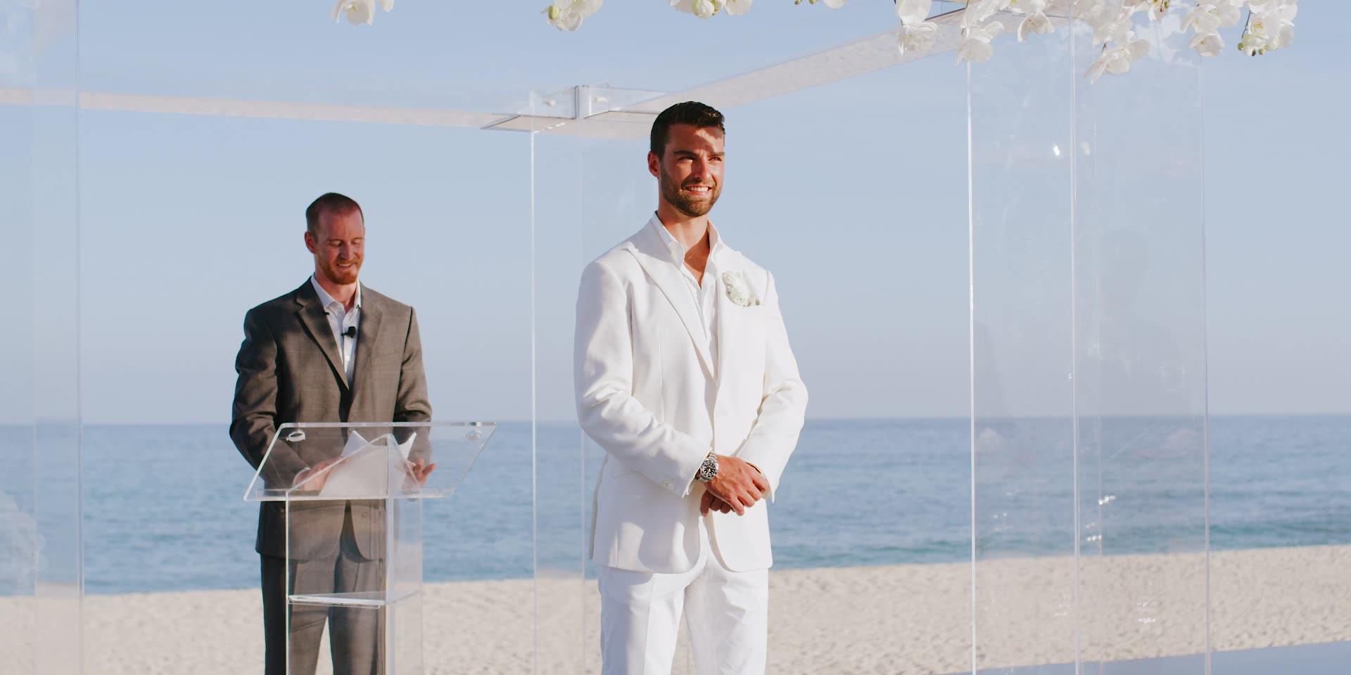 Justin waiting at the clear altar with the Sea of Cortez behind him in Los Cabos