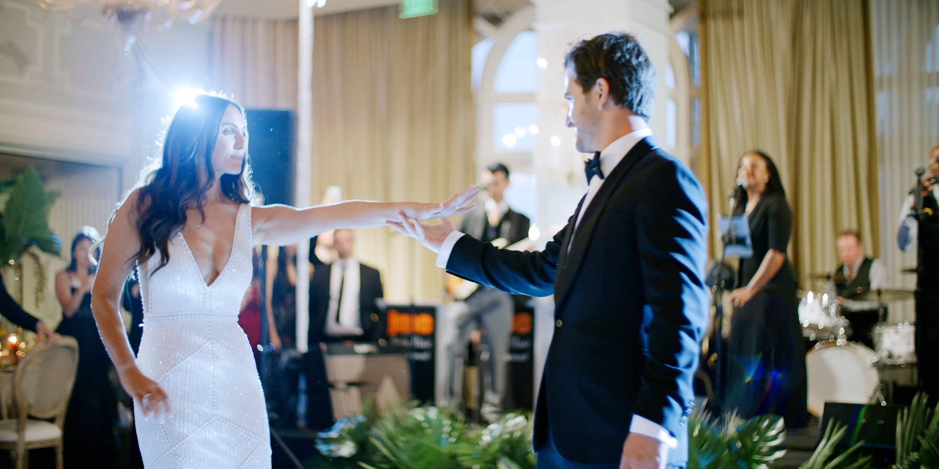 First dance at a Hotel Casa Del Mar wedding reception with a live band