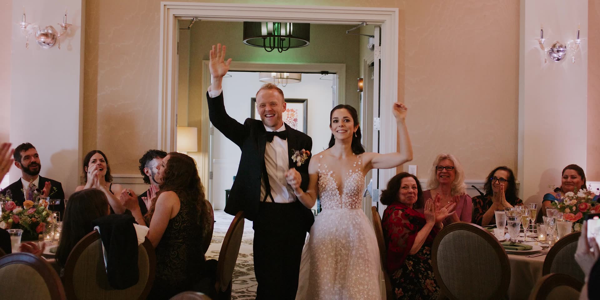 Kevin and Maya's entrance into the reception at Belmond El Encanto