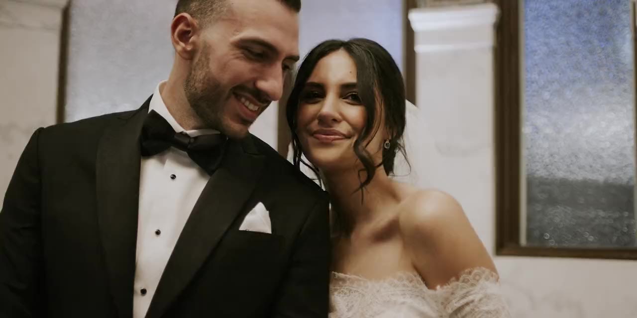 Markar and Giavonna laughing together, a moment from their wedding film