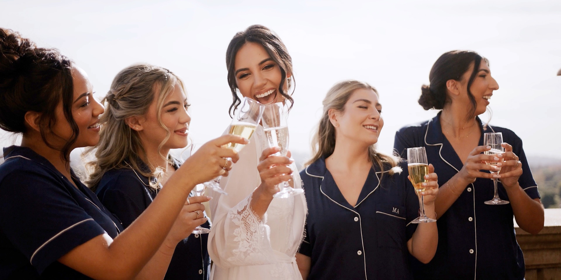 Bridesmaids toasting with champagne before a Vibiana wedding in Los Angeles
