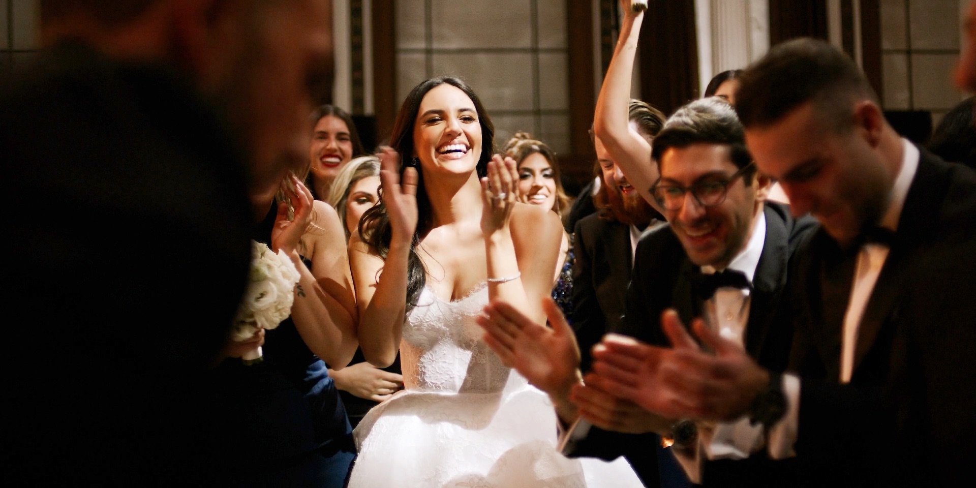 Guests celebrating around the bride at a Vibiana wedding reception in downtown Los Angeles