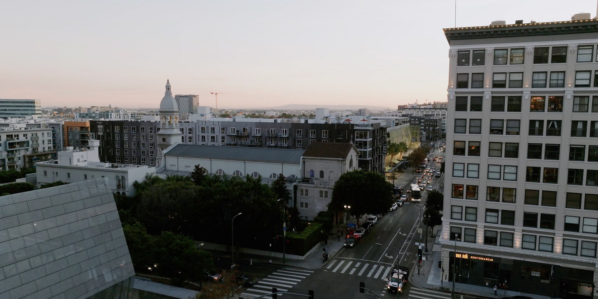 Vibiana at dusk in downtown Los Angeles, the former 1876 cathedral and its bell tower above the city street