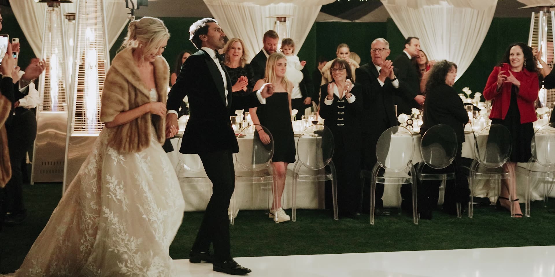 Sumil and Krista entering the tented reception at Bel-Air Country Club